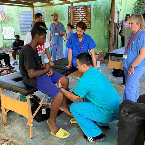 Team checking on patient's knee